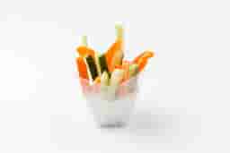 Fresh vegetable appetizer: carrots, bell peppers, celery, cucumbers in Blue Cheese sauce