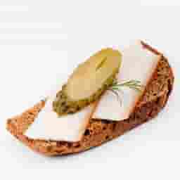 Borodino bread sandwich with bacon and pickles.