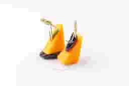 Canape with Cheddar cheese and plumbs