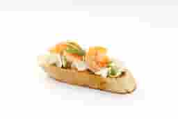 Bruschetta with cream cheese, pesto, and shrimp